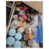 Drawer of spray paint- garage
