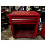 red Waterloo Industries three-drawer rolling tool