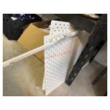 IKEA SKï¿½DIS white pegboard system with vertical