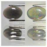 0.71ct 9x6.5mm Oval Cabochon Natural Black Opal -