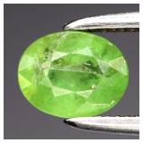 0.69ct 5.8x4.5mm Oval Natural Green Demantoid Garn
