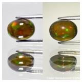 0.9ct 8x6.3mm Oval Cabochon Natural Black Opal - C