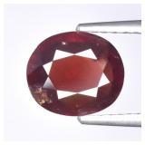 1.73ct 8.2x7mm Oval Natural Reddish Orange Garnet
