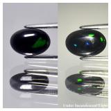 0.63ct 8.5x5.8mm Oval Cabochon Natural Black Opal