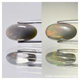 0.84ct 10.5x5.8mm Oval Cabochon Natural Black Opal