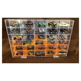 30 hot wheels vehicles in display case