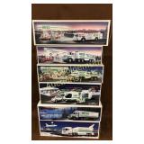 6 Hess trucks some boxes dirty