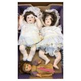 2 porcelain dolls, one other,1 need legs restrung