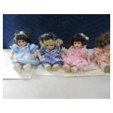 (4) #d MARIE OSMOND 7" Porcelain Dolls w/ Paperwrk