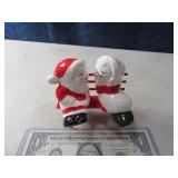 Kissing Santa&Mrs on Bench Salt & Pepper SET