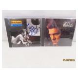 (2) autographed CHRIS ISAAK Music CD's