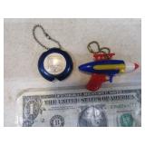 Lot (2) Vtg. Key Chains Plastic Gun & Adv Tape Msr