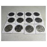 Lot(12) Eisenhower $1 Coins in sleeves
