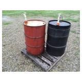 2 55 gallon drums, one metal, one plastic plastic