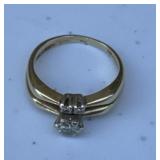 Yellow gold solitaire set ring