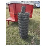 Roll woven wire fencing and barb wire