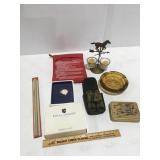 Miscellaneous binoculars, ashtrays, candles,