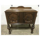 Vintage wood cabinet on wheels