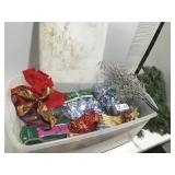 Christmas decor items in a tote