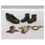 Metal shoes paper weights and western patches