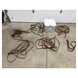 6 pieces of horse tack in a tote