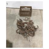 Used horseshoes in milk crate