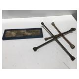 2 lug wrenches and a partial tap and die set