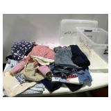 Clothing, aprons and more in a tote