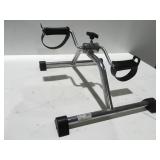 Stationary pedal exerciser