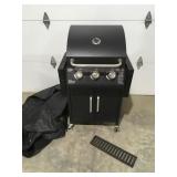 Outdoor gas grill with tank and cover