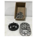 Wheel spacers, and lug nuts