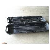 Golf bag carrier with clubs