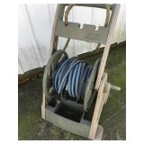 Outdoor hose reel with hose