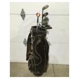Golf clubs and Ram bag