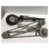 Universal drafting machine magnifying light