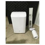GE Air conditioner turns on