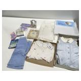 Baby clothes, blanket, and more some unused