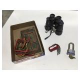 Binoculars hooks, knife, master lock