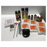 Gun cleaning items, some partial container