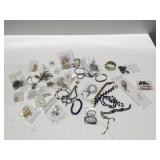 Costume and homemade jewelry, some pens,