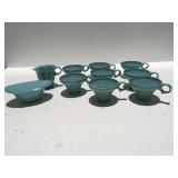 Vintage mid-century, sleek teal colored cups