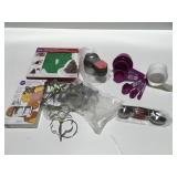 Kitchen items, cookie cutters, measuring cups,