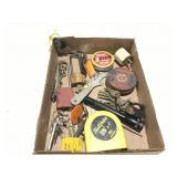 Keys, locks pellets, flashlight, tape measure