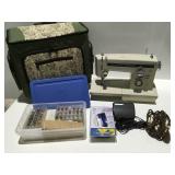 Kenmore 16410  sewing machine and sewing bag on
