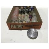 Shot glasses and aluminum coasters