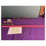 (2) ice fishing poles (1) reel (2) wire pole