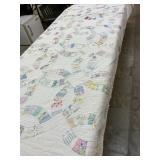 Antique handmade wedding ring quilt. Significant