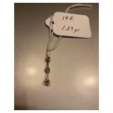 14K PENDANT 1.23 GRAMS