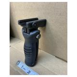 Rail mounted pistol grip foldable
