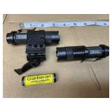 Two tactical lights, one battery